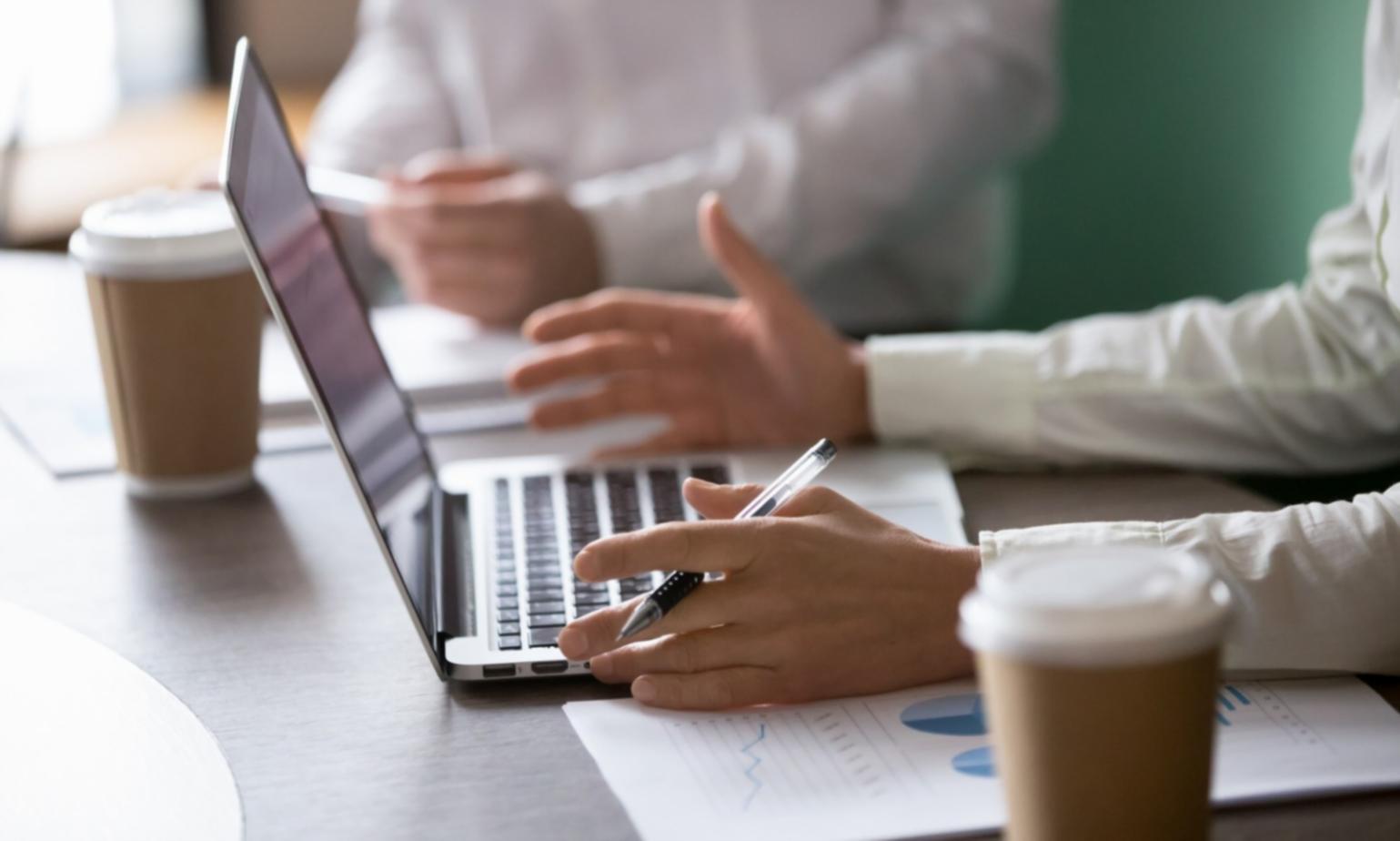 Financial planning workspace with calculator and documents